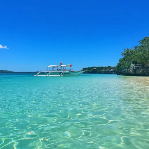 TravelToPH - Экскурсии / Туры - Вариант A - Утренний круиз по островам + дневная экскурсия по городу: остров Вирджин - остров Хилантагаан - Церковь Святого Петра Апостола - пещера Огтонг - пляж Кота | VB-OAMIHALTVIHILSPAPOCKB-D1