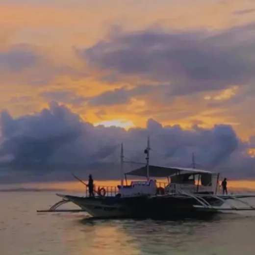 TravelToPH - Экскурсии / Туры - Круиз на закате: прогулка на лодке вдоль побережья Малапаскуа | VM-SCBTACOM-D1